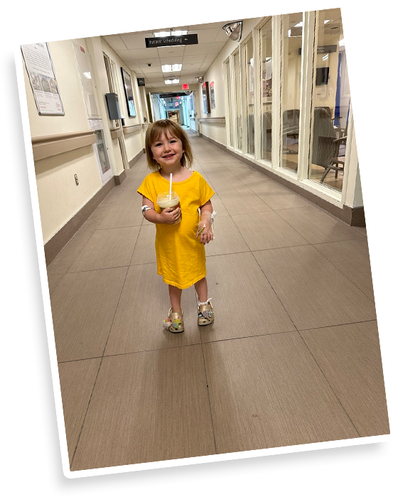 A young Emma in hospital when first diagnosed