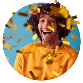 Man celebrating with confetti in the air