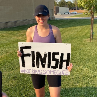 Girl Holding Sign